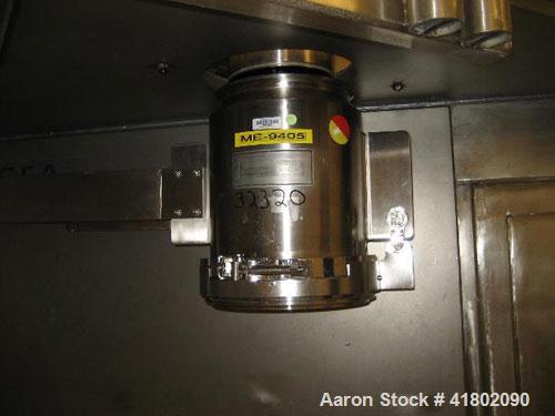 Used Quadro Comil, model U20, serial  #U20-0142, new 1999.