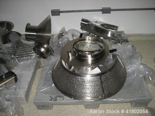 Used Quadro Cone Mill, Model 198, Stainless Steel. 25 hp 230/460 volt XP motor. Perforated screen with approximately 3/8" X 3/8" perforations.