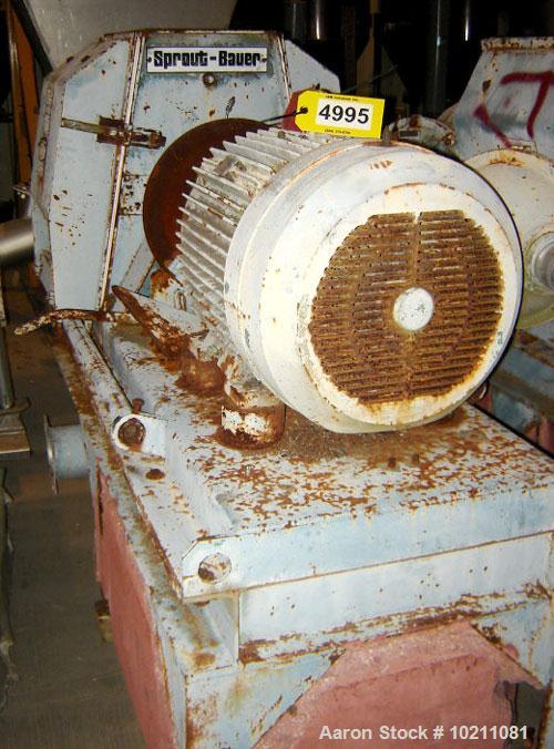 Used 60 HP Sprout Bauer Hammermill, Model 22183. 60 hp Reliance energy efficient XT-Extra Tough 460 volt, 364TS frame, 3560 rpm, operating temperature code T3C. Hammermill comes complete with hand br...