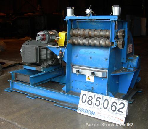 USED: Williams Meteor hammermill, model 26, carbon steel. 32" diameter x 28" wide rotor with 12 rows of (28) 2-1/2" wide x 1/4" thick swinging hammers. Top feed, no hopper, side sheet feed with pneum...