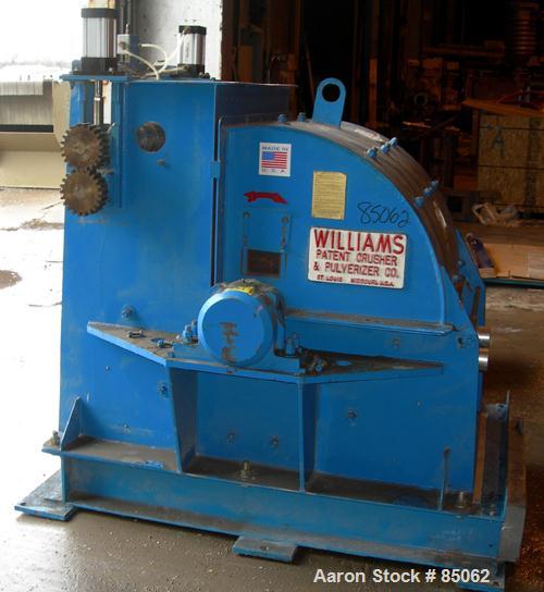 USED: Williams Meteor hammermill, model 26, carbon steel. 32" diameter x 28" wide rotor with 12 rows of (28) 2-1/2" wide x 1/4" thick swinging hammers. Top feed, no hopper, side sheet feed with pneum...