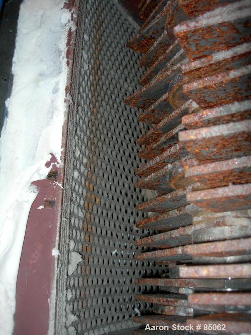USED: Williams Meteor hammermill, model 26, carbon steel. 32" diameter x 28" wide rotor with 12 rows of (28) 2-1/2" wide x 1/4" thick swinging hammers. Top feed, no hopper, side sheet feed with pneum...