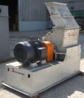 Used Jacobson Commander Half Circle Hammer Mill, model 2424, carbon steel. Approximate 24