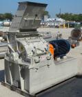 Used Jacobson Commander Half Circle Hammer Mill, model 2424, carbon steel. Approximate 24