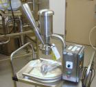 Used Quadro Comil, Model 193, Stainless Steel. Gravity feed with feed chute, beater and screen. Direct coupled .25 hp motor with VFD controller. Bench top design on stand, seria l#0064.  PRICE INCLUD...