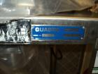 Used Quadro Comil, Model 194. Stainless steel construction, with feed hopper on cantilievered stainless steel base, serial# P194-0945.