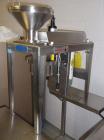 Used Quadro Comil, Model 197S. Stainless steel construction, on base with beater, 1HP, 90 volt DC motor with controller, serial# 197-0736.