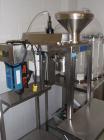 Used Quadro Comil, Model 197S. Stainless steel construction, on base with beater, 1HP, 90 volt DC motor with controller, serial# 197-0736.