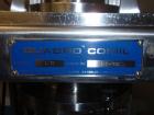 Used Quadro Comil, Model 197S. Stainless steel construction, on base with beater, 1HP, 90 volt DC motor with controller, serial# 197-0736.