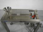 Used Quadro Comil, model 197S, stainless steel construction, with beater, on stainless steel stand with 1 hp, 1745 rpm, 230/460 volt mechanical variable speed motor drive, xp, serial# 197-0430.
