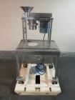 Used Quadro Comil, Model 197S, Stainless Steel. With beater and screen. Mounted on portable cart with 1hp, 230/460 volt XP motor. Serial# 197-1-061.