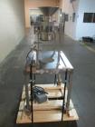 Used Quadro Comil, Model 197S, Stainless Steel. With beater and screen. Mounted on portable cart with 1hp, 230/460 volt XP motor. Serial# 197-1-061.