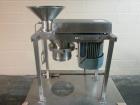 Used Quadro Comil, Model 197S, Stainless Steel. With beater and screen. Mounted on portable cart with 1hp, 230/460 volt XP motor. Serial# 197-1-061.