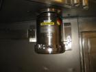 Used Quadro Comil, model U20, serial  #U20-0142, new 1999.