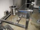 Used Quadro Comil, Model U20, Stainless Steel. Approximate capacity up to 4250 pounds an hour. Top feed, bottom discharge. Driven by an approximate 5 hp motor. Mounted on stainless steel frame with c...