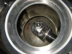 Used Quadro Comil, Model U20, Stainless Steel. Approximate capacity up to 4250 pounds an hour. Top feed, bottom discharge. Driven by an approximate 5 hp motor. Mounted on stainless steel frame with c...