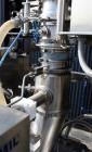 Unused- Quadro Comil, Model U20, 316L Stainless Steel. Mirror internal polish, 304 stainless steel non-contact surfaces. CIP design, approximate capacity up to 4250 pounds an hour. Top feed, bottom d...