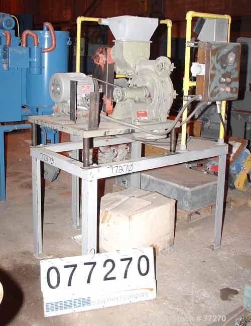 USED: Raymond hammermill, carbon steel. 12" diameter x 3-1/2" widechamber. 8 swinging hammers driven by a 7.5 hp motor. 3" diameter x12" long top screw feed with hopper driven by a 1/2 hp motor. Moun...