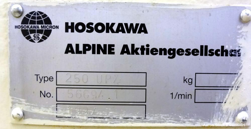 Used Hosokawa Alpine UPZ Fine Impact Mill, Model 250 UPZ, Carbon Steel. (1) Swing type beater with (8) bolt on tip blades, (1) approximate 9" diameter x 5" deep sieve ring with screen. 3" x 4-1/2" To...