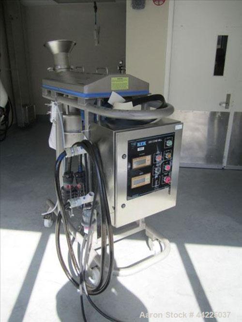 Used Kemutec Cone Mill, Model KEK 220, Stainless Steel. On portable base, 5 hp, 460 volt, 1700 rpm belt drive.