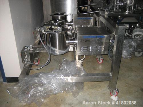 Used Quadro Comil, Model U20, Stainless Steel. Approximate capacity up to 4250 pounds an hour. Top feed, bottom discharge. Driven by a 5 hp, 3/60/208-230/460 volt, 1760 rpm motor. Mounted on stainles...