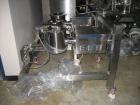 Used Quadro Comil, Model U20, Stainless Steel. Approximate capacity up to 4250 pounds an hour. Top feed, bottom discharge. Driven by a 5 hp, 3/60/208-230/460 volt, 1760 rpm motor. Mounted on stainles...