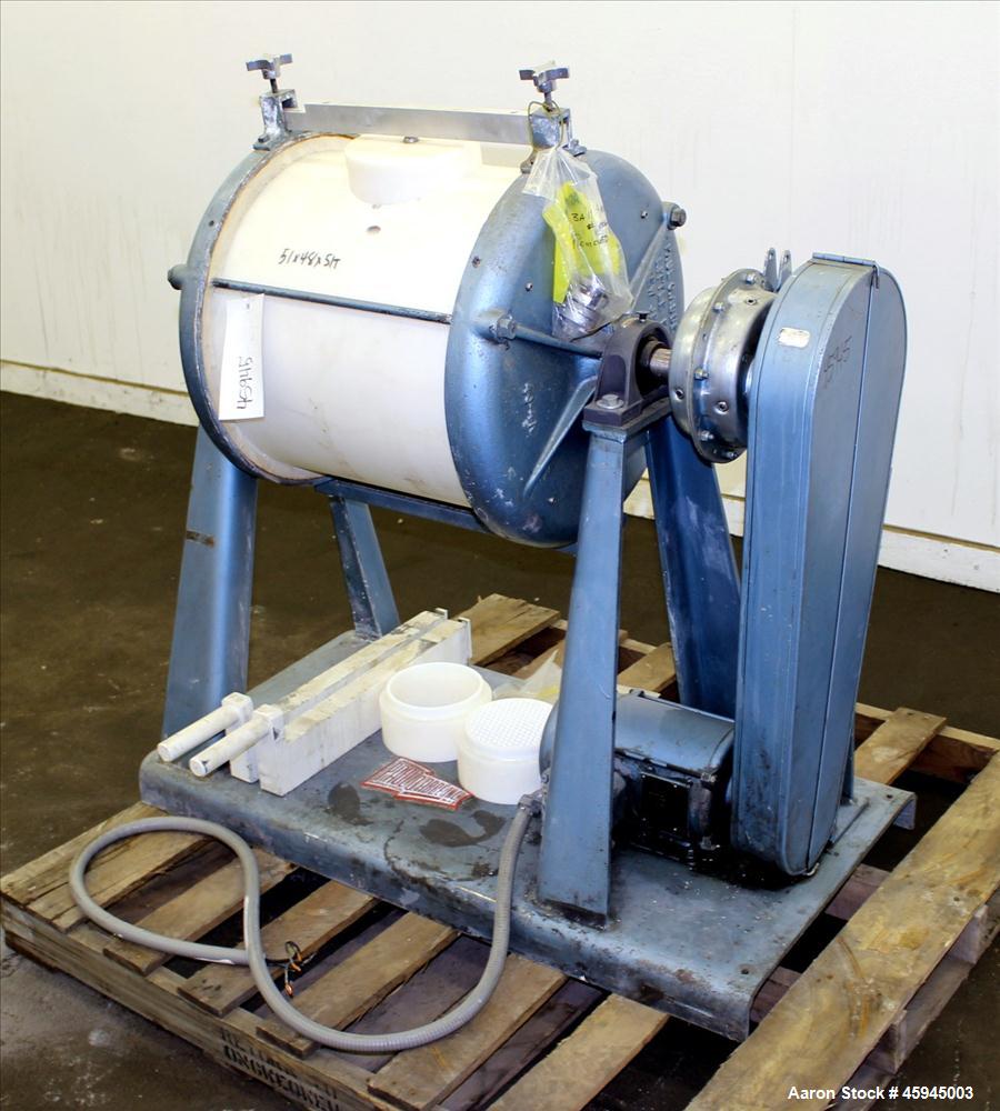 Used Paul O Abbe #4 Jar Mill, Approximate 20 Gallon. Plastic Jar approximate 18" diameter x 20" straight side. Jar speed 39 rpm. Belt driven by .5 hp, 1725 rpm, 208-230/460 volt motor, thru reducer, ...