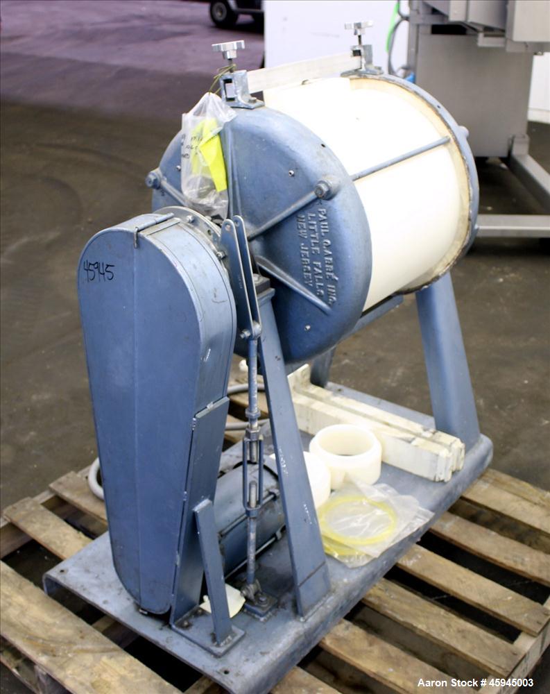 Used Paul O Abbe #4 Jar Mill, Approximate 20 Gallon. Plastic Jar approximate 18" diameter x 20" straight side. Jar speed 39 rpm. Belt driven by .5 hp, 1725 rpm, 208-230/460 volt motor, thru reducer, ...