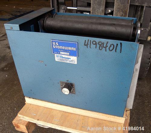 Used U.S. Stoneware Jar Rolling Mill. Single tier, (2) 2’’ diameter x 13" long rubber rollers, driven by an approximate 1/4 HP motor. Approximate 60 pound load capacity. Base mounted with speed contr...