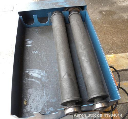 Used U.S. Stoneware Jar Rolling Mill. Single tier, (2) 2’’ diameter x 13" long rubber rollers, driven by an approximate 1/4 HP motor. Approximate 60 pound load capacity. Base mounted with speed contr...