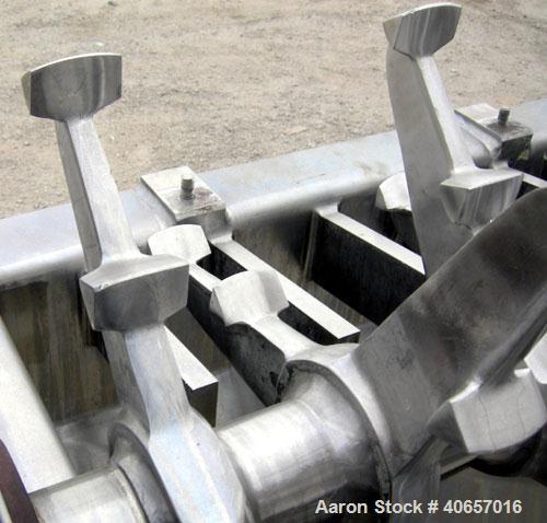 Used Lump Breaker, dual shaft, 304 stainless steel. (1) 4" diameter shaft with (7) 3 blade hook style knives, (1) 4" diameter shaft with (6) 3 blade hook style knives. (2) sets of stationary bars. 40...
