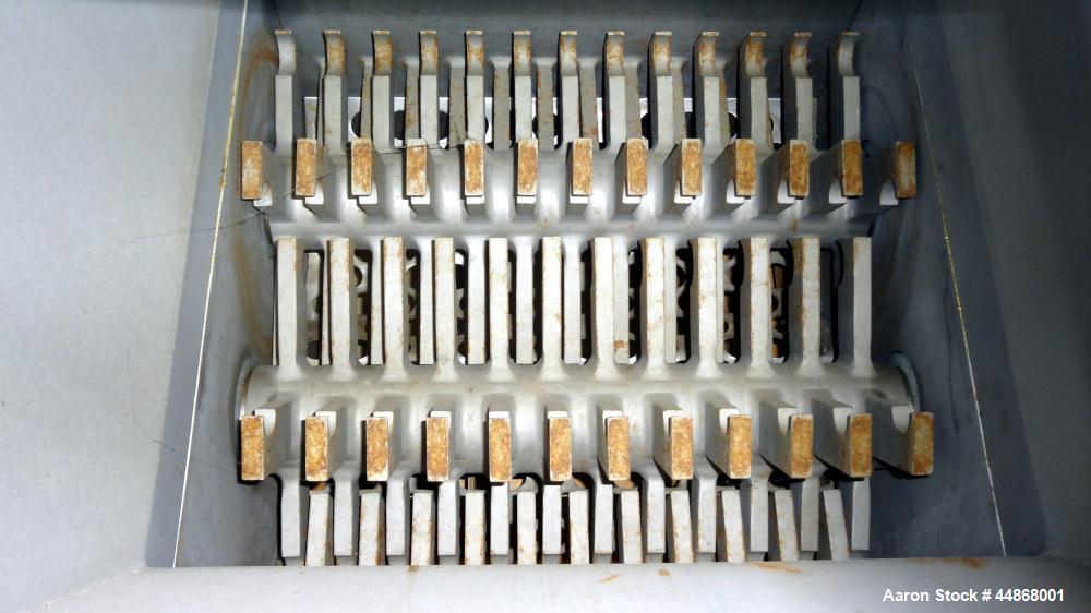 Used Machine & Process Design Dual Rotor Crusher Lump Breaker, 304 Stainless Steel. Approximate 18" x 18" feed throat with a top mounted hopper with safety grate and hinged charge port section. (2) C...