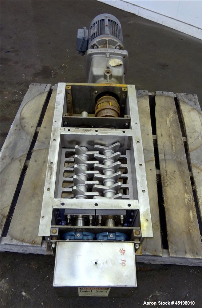 Used Dual Shaft Lump Breaker, 316 Stainless Steel. 12" x 12" Feed, no hopper. Approximate 1/2" thick fixed blades. Driven by a 5hp, 3/60/230/460 volt, 1750 rpm gear motor, ratio 24.41 to 1.