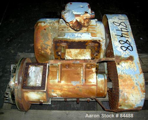 USED: Lump breaker, stainless steel. Flange mount, approx 7-1/2" diameter rotor. Driven by a 10 hp, 3/60/230/460 volt, 1725 rpm XP motor.