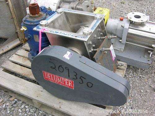 Used Franklin Miller Delumper, Model 1077S4DC, stainless steel. Sanitary design. Approximately 8" diameter x 12" wide rotor with teeth, side sizing combs. 12" x 12" feed opening. Requires motor.
