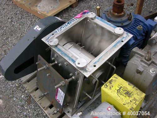 Used Franklin Miller Delumper, Model 1077S4DC, stainless steel. Sanitary design. Approximately 8" diameter x 12" wide rotor with teeth, side sizing combs. 12" x 12" feed opening. Requires motor.

