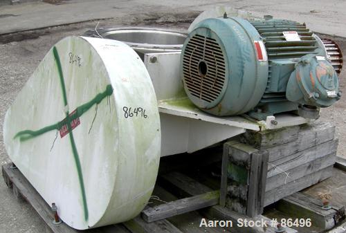 Used Franklin Miller Inline Pipe Delumper, Model PD24, 304 Stainless Steel. Approximate 24" diameter opening, 32" OD mounting flange. 5-1/2" diameter shaft with 9 rotating knives approximately 1" thi...