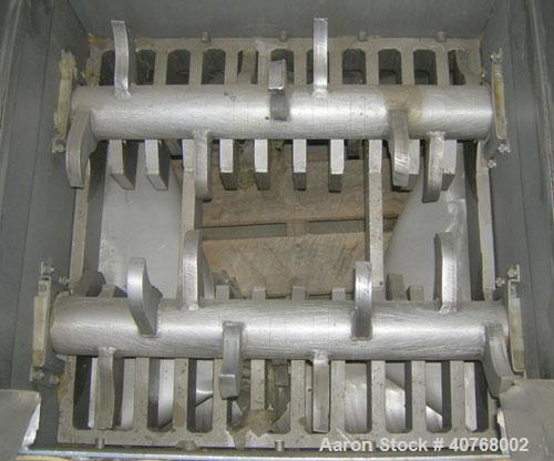 Used Jacobson Dual Rotor Full Nelson  Crusher, Model 2424DR.FNC, 304 stainless steel. (2) 3" diameter shafts with 3/4" thick fixed hook style blades, (2) rows of stationary bars. 24" x 24" feed openi...