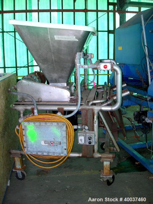 Used Jacobson Double rotor finger crusher, model 12 x 9, 316 stainless steel. 9" X 11 1/2" feed opening with hopper. Driven by a 1hp,3/60/230/460 volt, 1730 rpm gearmotor. Mounted on a stainless stee...