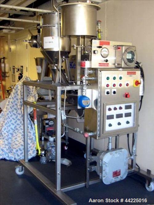 Used Kemutec Kek Pin Mill System, Model 5H. Driven by a 5 hp, 230/460 volt motor. With rotary feeder, dust filter, and discharge hopper. On portable stands with controls. Built 2/2005, serial #A22636.
