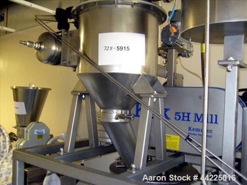 Used Kemutec Kek Pin Mill System, Model 5H. Driven by a 5 hp, 230/460 volt motor. With rotary feeder, dust filter, and discharge hopper. On portable stands with controls. Built 2/2005, serial #A22636.