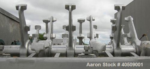 Used Lump Breaker, dual shaft, 304 stainless steel. (1) 4" diameter shaft with (7) 3 blade hook style knives, (1) 4" diameter shaft with (6) 3 blade hook style knives. (2) sets of stationary bars. 40...