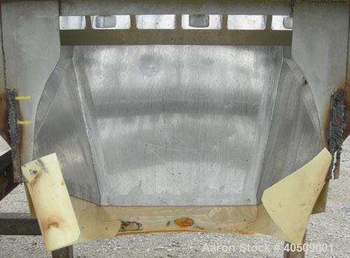 Used Lump Breaker, dual shaft, 304 stainless steel. (1) 4" diameter shaft with (7) 3 blade hook style knives, (1) 4" diameter shaft with (6) 3 blade hook style knives. (2) sets of stationary bars. 40...