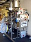 Used Kemutec Kek Pin Mill System, Model 5H. Driven by a 5 hp, 230/460 volt motor. With rotary feeder, dust filter, and discharge hopper. On portable stands with controls. Built 2/2005, serial #A22636.