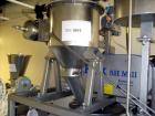 Used Kemutec Kek Pin Mill System, Model 5H. Driven by a 5 hp, 230/460 volt motor. With rotary feeder, dust filter, and discharge hopper. On portable stands with controls. Built 2/2005, serial #A22636.