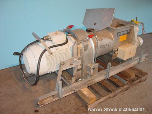 Used Bucher apple grinding disc mill, model CM50, stainless steel. 30 kW motor for main grinding head, 3 kW motor for 14 inch diameter x 30 inch long feed conveyor in self contained hopper, 9.5 inch ...