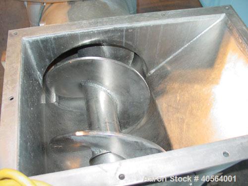 Used Bucher apple grinding disc mill, model CM50, stainless steel. 30 kW motor for main grinding head, 3 kW motor for 14 inch diameter x 30 inch long feed conveyor in self contained hopper, 9.5 inch ...