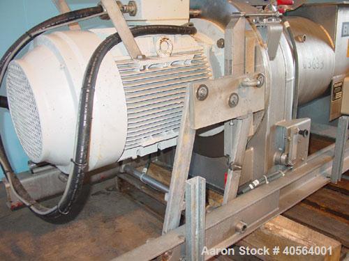 Used Bucher apple grinding disc mill, model CM50, stainless steel. 30 kW motor for main grinding head, 3 kW motor for 14 inch diameter x 30 inch long feed conveyor in self contained hopper, 9.5 inch ...