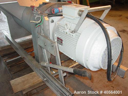 Used Bucher apple grinding disc mill, model CM50, stainless steel. 30 kW motor for main grinding head, 3 kW motor for 14 inch diameter x 30 inch long feed conveyor in self contained hopper, 9.5 inch ...