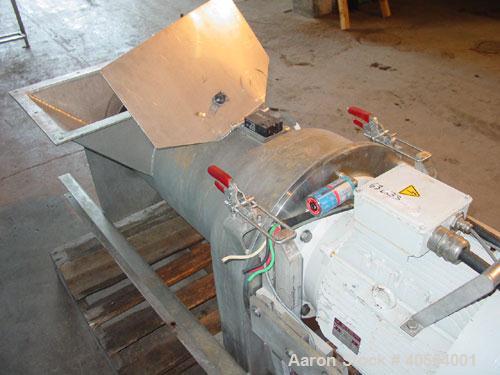 Used Bucher apple grinding disc mill, model CM50, stainless steel. 30 kW motor for main grinding head, 3 kW motor for 14 inch diameter x 30 inch long feed conveyor in self contained hopper, 9.5 inch ...